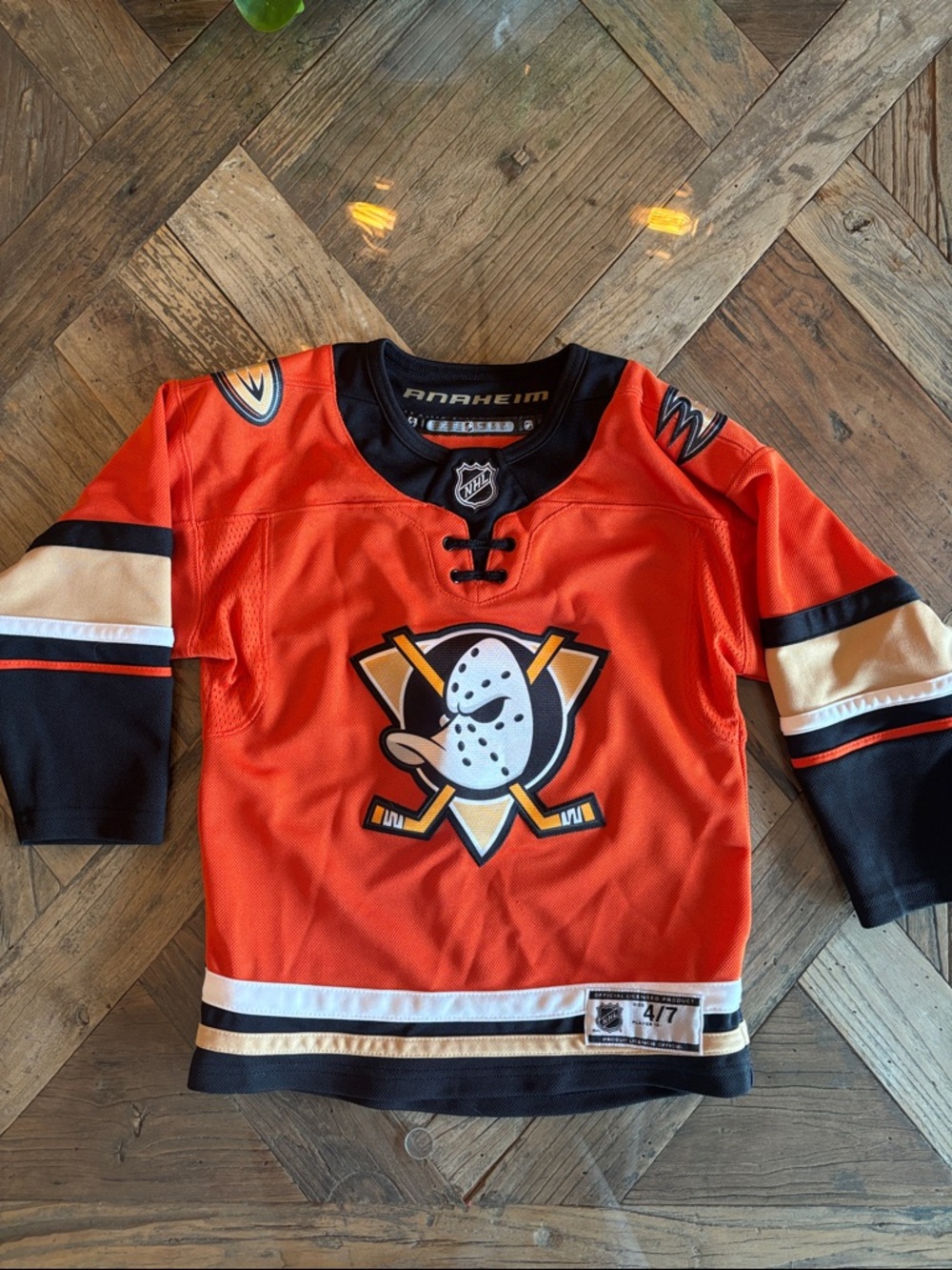 NHL Anaheim Ducks Kids Orange Hockey Jersey with Black & White Accents size 4-7